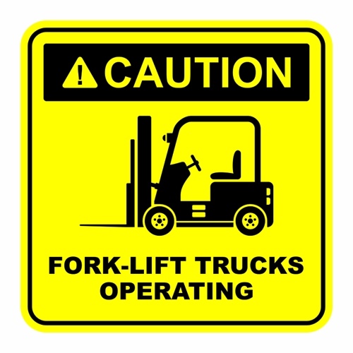 Safety signs make visitors aware of warehouse dangers.