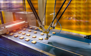Picture of a robotic assembly line for food and beverage products.