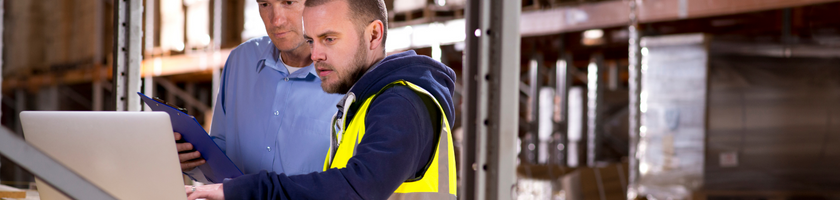 warehouse workers monitoring inventory control