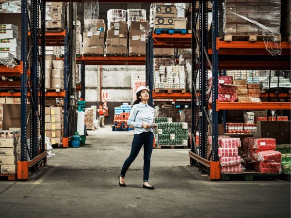 image a woman working in a warehouse where offline inventory control software is used